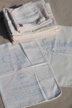 catalog photo of lot of vintage sugar sacks w/ printed advertising graphics, fine light cotton feedsack fabric 