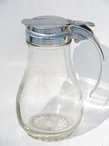 photo of lot of vintage syrup pitchers, glass jars, chrome or aqua plastic lids #2