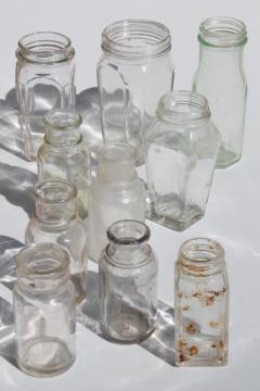 catalog photo of lot old antique glass food jars, condiment bottles, vintage spice jars