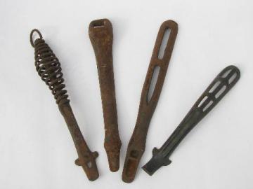 catalog photo of lot old antique iron stove burner lifter handles, vintage kitchen