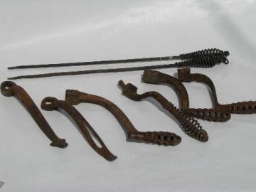 catalog photo of lot old antique iron stove burner lifter handles, vintage kitchen