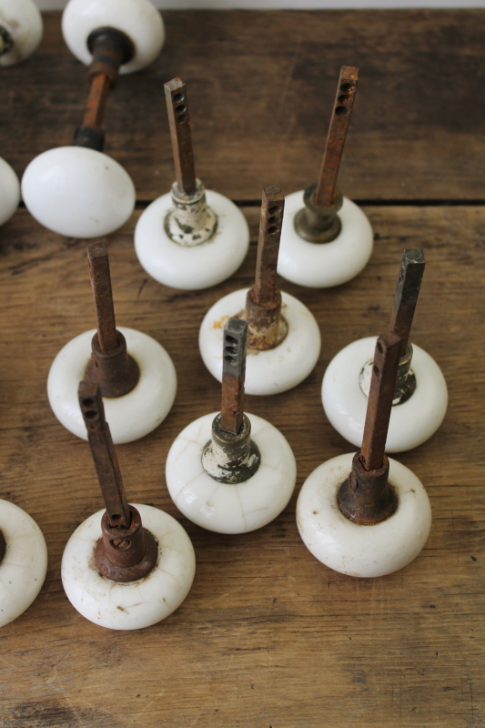 photo of lot old antique white porcelain door knobs for repurpose or upcycle, crazed stained shabby  #10