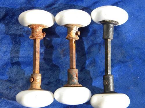 photo of lot old antique white porcelain doorknobs, vintage architectural hardware #4