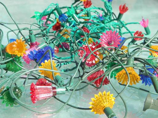 photo of lot old midget Christmas tree lights, fancy plastic flower reflectors #1