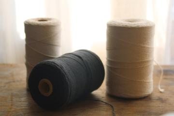 catalog photo of lot vintage black & natural white cotton string or package tying cord, big old spools of heavy cotton thread