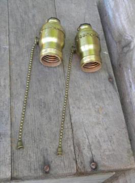 catalog photo of lot vintage brass Hubbell sockets w/pull chains replacement lamp part