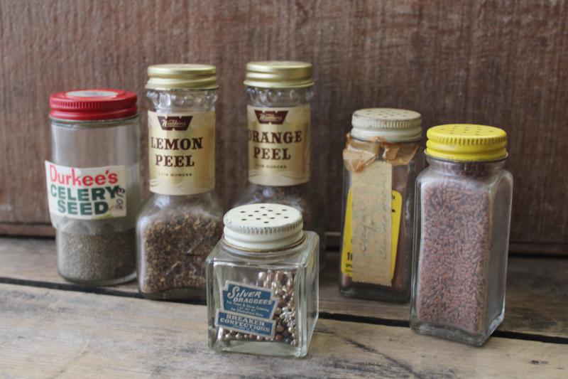 photo of lot vintage glass spice jars, some metal shaker lids, old advertising labels #1