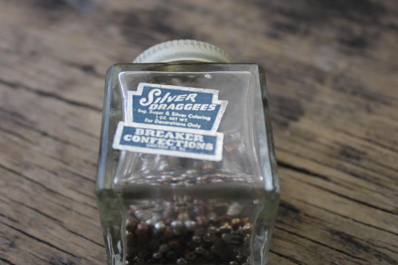 photo of lot vintage glass spice jars, some metal shaker lids, old advertising labels #3