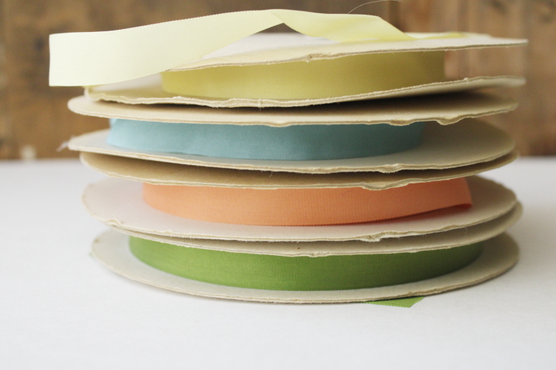 photo of lot vintage rayon ribbon seam binding tape sewing trim, 100 yard rolls olive green, peach, blue, yellow #7