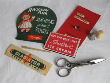 catalog photo of lot vintage sewing notions, old needle books, bone bodkin tool etc.