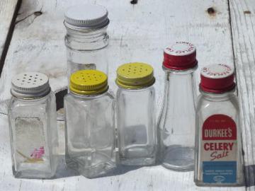 catalog photo of lot vintage spice jars and small kitchen bottles, some w/ metal shaker lids