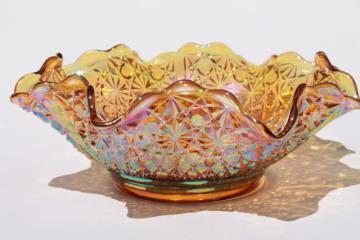 catalog photo of marigold amber iridescent vintage Fenton glass daisy & button pattern large crimped bowl