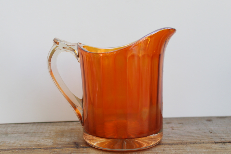photo of marigold orange vintage carnival glass pitcher, large creamer amber iridescent color glass  #1