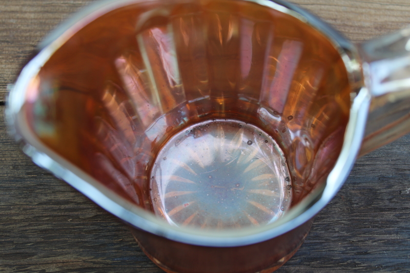 photo of marigold orange vintage carnival glass pitcher, large creamer amber iridescent color glass  #4