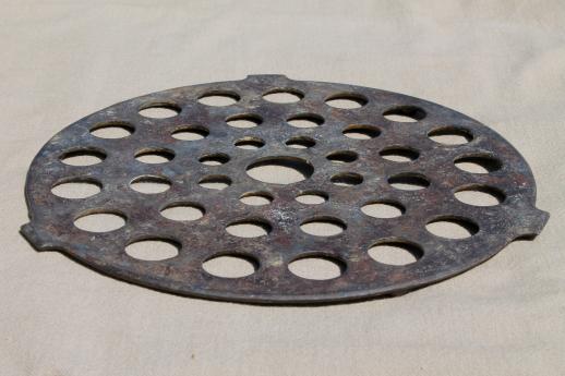 photo of marked Griswold 8 inch diameter trivet, vintage pot / skillet pan rack insert #5