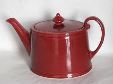 catalog photo of maroon red pottery teapot, vintage ceramic tea pot, oval shape