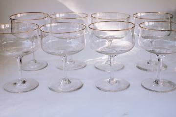 catalog photo of mid-century mod vintage gold band champagne glasses or coupe shape cocktails