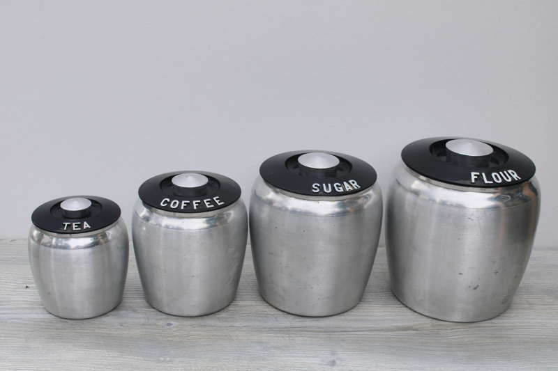 photo of mid-century modern vintage Kromex metal canisters, spun aluminum canister set #1