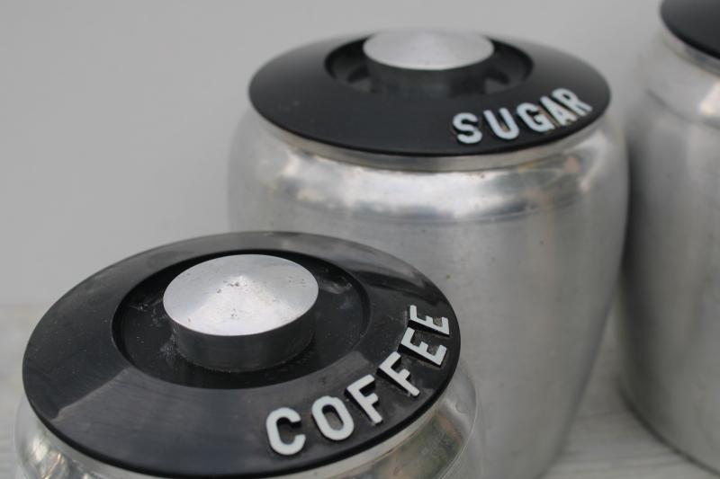 photo of mid-century modern vintage Kromex metal canisters, spun aluminum canister set #6