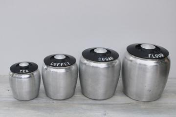 catalog photo of mid-century modern vintage Kromex metal canisters, spun aluminum canister set