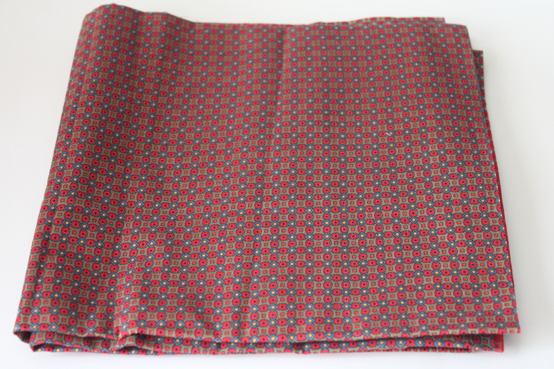 photo of mid century modern vintage menswear fabric, Bates branded cotton w/ foulard print on red #1