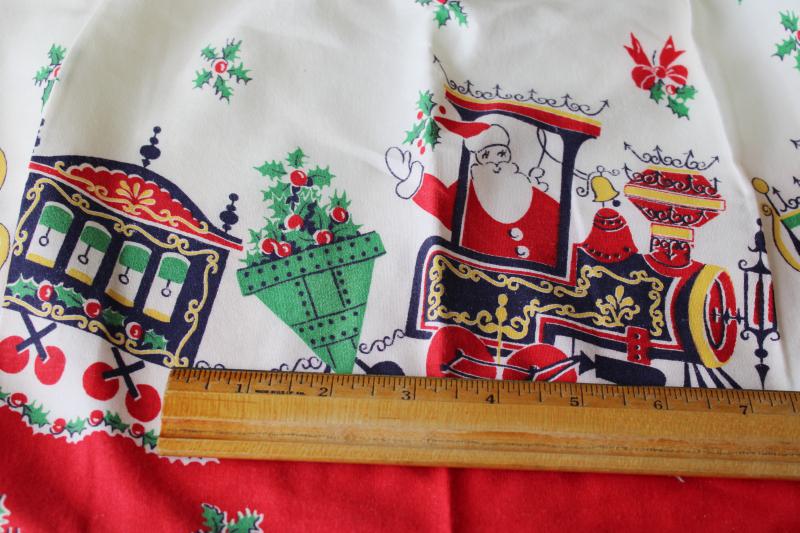 photo of mid-century vintage Christmas print cotton half apron, holiday Santa train #2