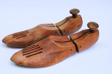 catalog photo of mid century vintage wood shoe stretchers, pair of wooden feet foot shape shoe trees 