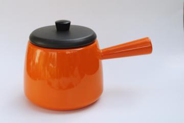 catalog photo of mid-century mod vintage orange enamel saucepan or fondue pot w/ matte black metal lid 