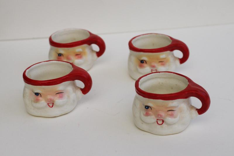 photo of mid-century vintage Japan ceramic Santa face mugs, Holt Howard mini winking Santas set #1