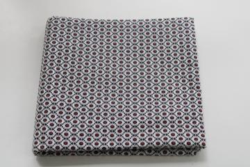 catalog photo of mid-century vintage cotton fabric, menswear foulard style print, black & red on white