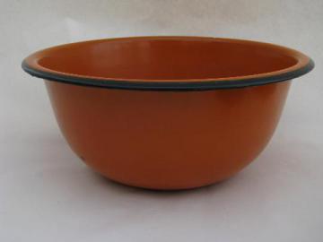 catalog photo of mid-century vintage enamel kitchen utility mixing bowl, mod orange color