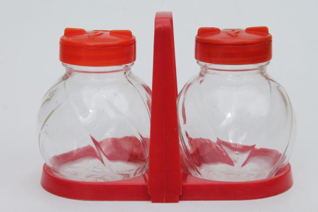 photo of mid-century vintage red plastic rack & glass shakers, retro kitchen S&P set #1