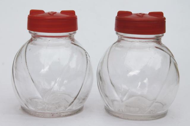 photo of mid-century vintage red plastic rack & glass shakers, retro kitchen S&P set #2