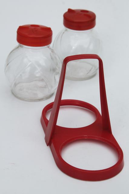 photo of mid-century vintage red plastic rack & glass shakers, retro kitchen S&P set #6