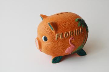 mid-century vintage vacation souvenir piggy bank, Florida orange pig w/ pink flamingo