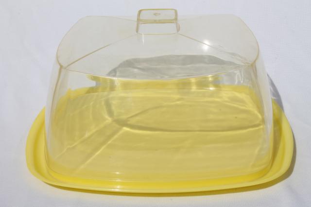 photo of mid-century vintage yellow plastic cake keeper saver, cake plate w/ clear dome cover #1