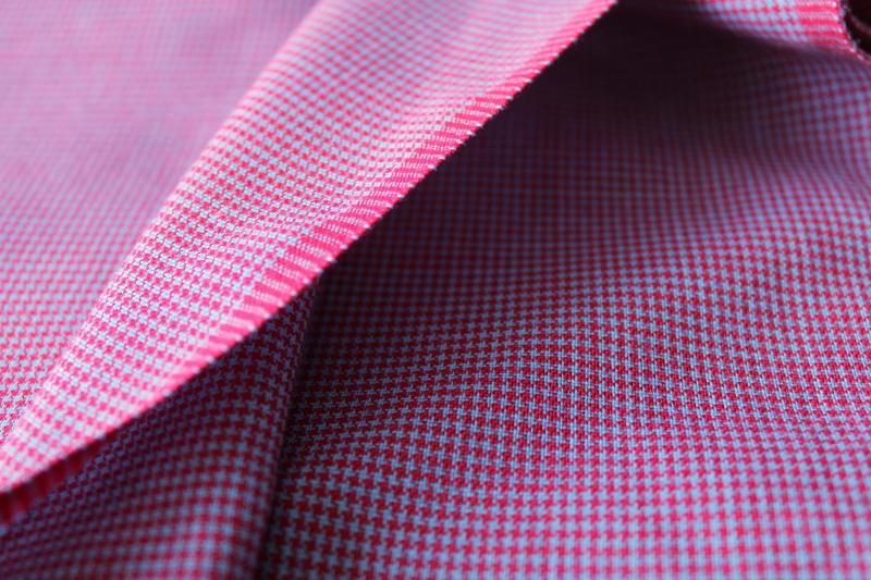 photo of mini houndstooth check suiting fabric, deep red and grey blue poly blend material #3