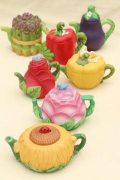 catalog photo of mini teapot collection, figural flower & vegetable tea pots, Avon vintage 1990s 