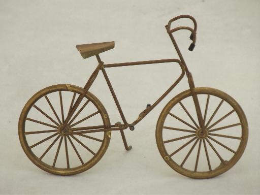 photo of miniature brass bicycle with working wheels, machine age steampunk style! #1