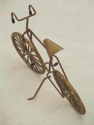 photo of miniature brass bicycle with working wheels, machine age steampunk style! #3