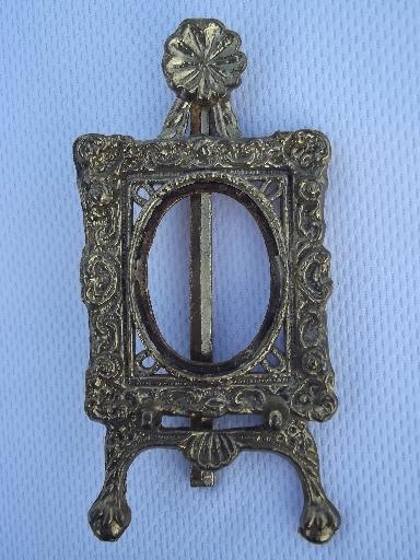 photo of miniature cast metal easel stand picture frame for oval photo or cameo #4