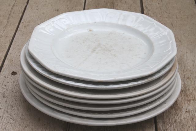 photo of mismatched antique 1860s - 1880s vintage ironstone china dinner plates w/ embossed borders #1