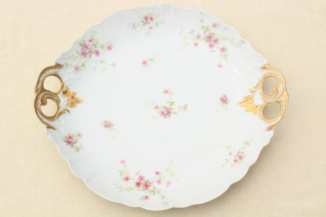 photo of mismatched antique vintage china plates w/ different patterns, pink roses florals #3