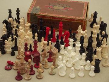 catalog photo of mixed lot vintage game pieces, old bone, bakelite, plastic chess pieces