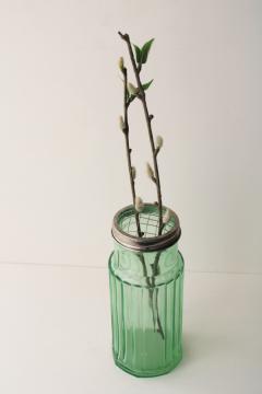 catalog photo of modern farmhouse style flower holder, vintage style green glass tall ribbed jar