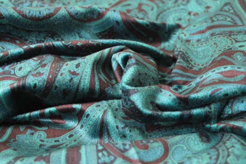 photo of modern velvety brushed poly fabric with suede like feel, paisley print on teal green #1