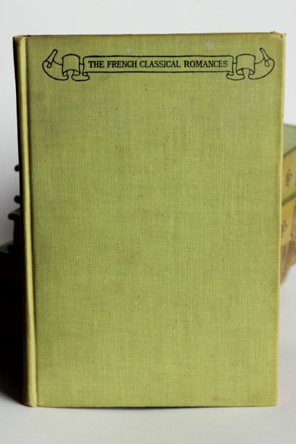 photo of mossy green vintage books, French romances faded worn photo prop library display #7