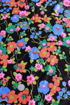 catalog photo of neon flowers on black vintage print polyester tricot fabric, retro dress / lingerie material