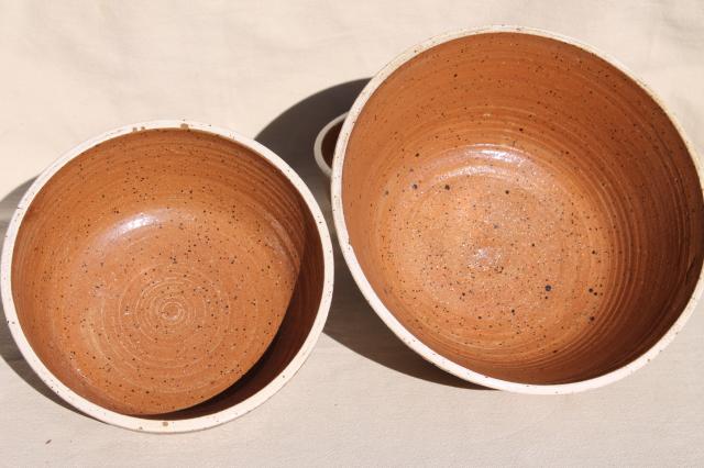 photo of nest of handmade painted studio pottery bowls, rustic clay graduated colors & sizes stack #11