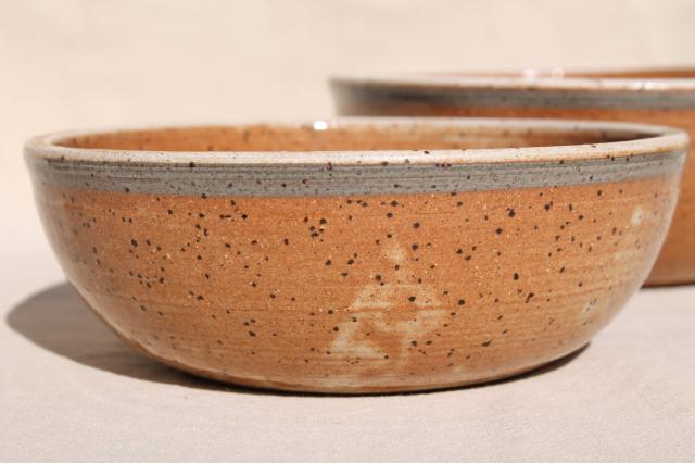 photo of nest of handmade painted studio pottery bowls, rustic clay graduated colors & sizes stack #15